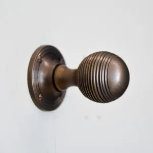 Distressed Antique Brass Reeded Beehive Door Knobs