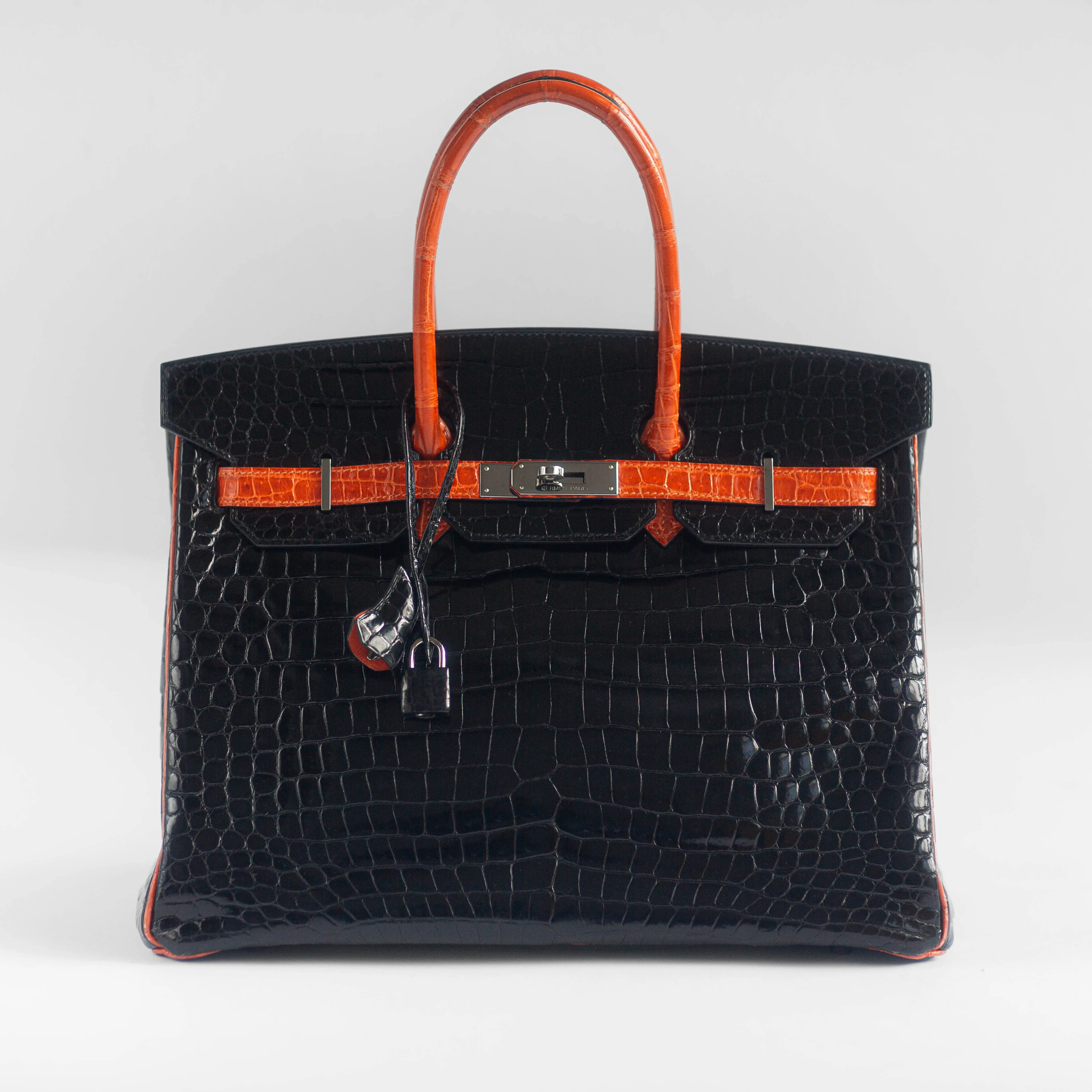 HERMÈS - BIRKIN 35 LIMITED EDITION HANDBAG IN BLACK AND ORANGE SHINY POROSUS CROCODILE WITH RUTHENIUM HARDWARE