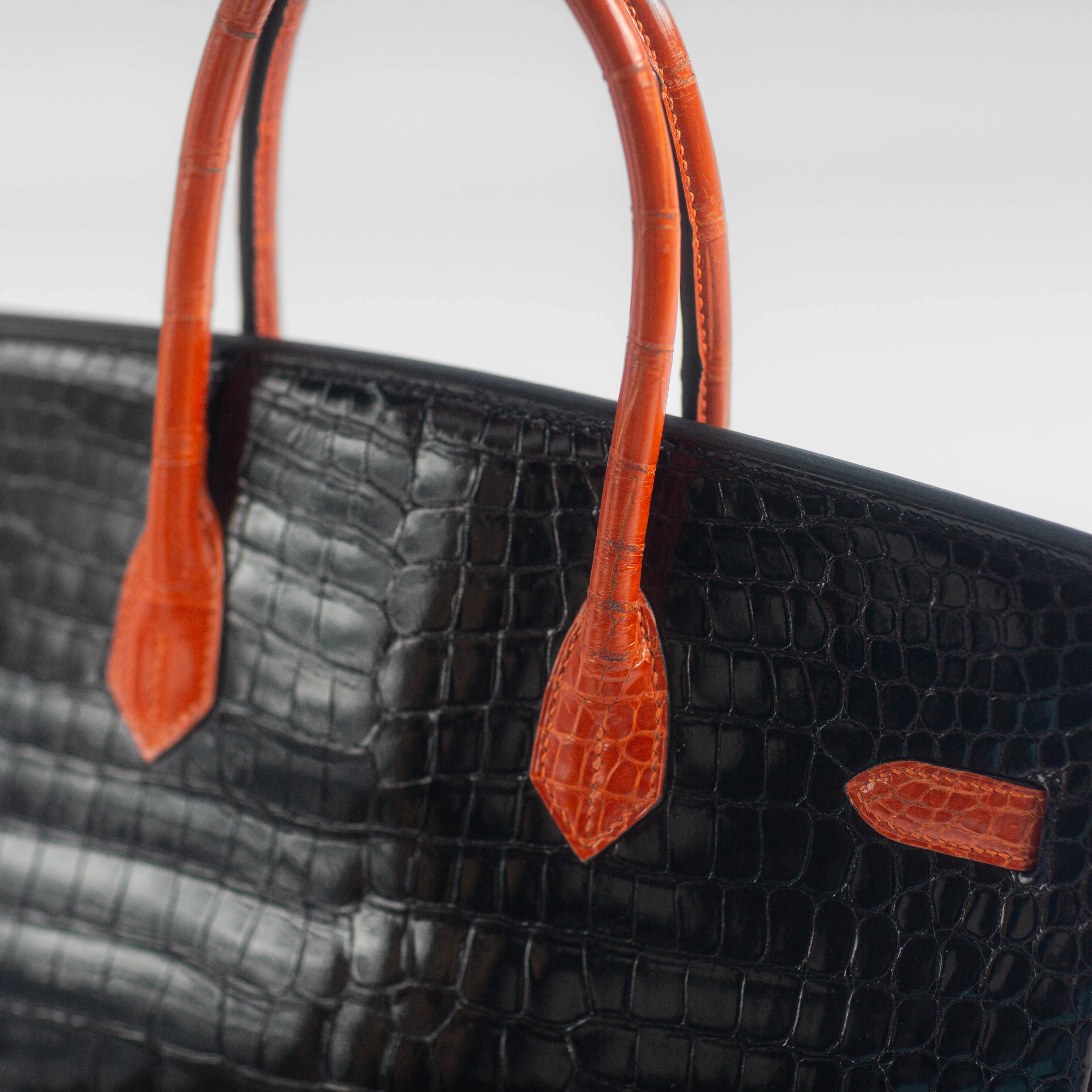 HERMÈS - BIRKIN 35 LIMITED EDITION HANDBAG IN BLACK AND ORANGE SHINY POROSUS CROCODILE WITH RUTHENIUM HARDWARE